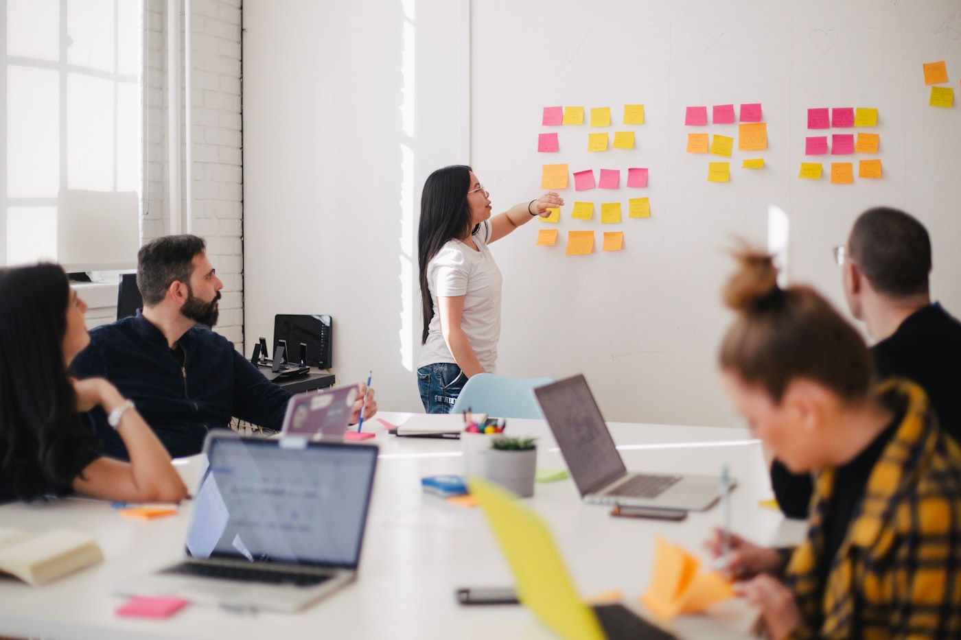 Brand workshop with notes on a wall during a positioning session