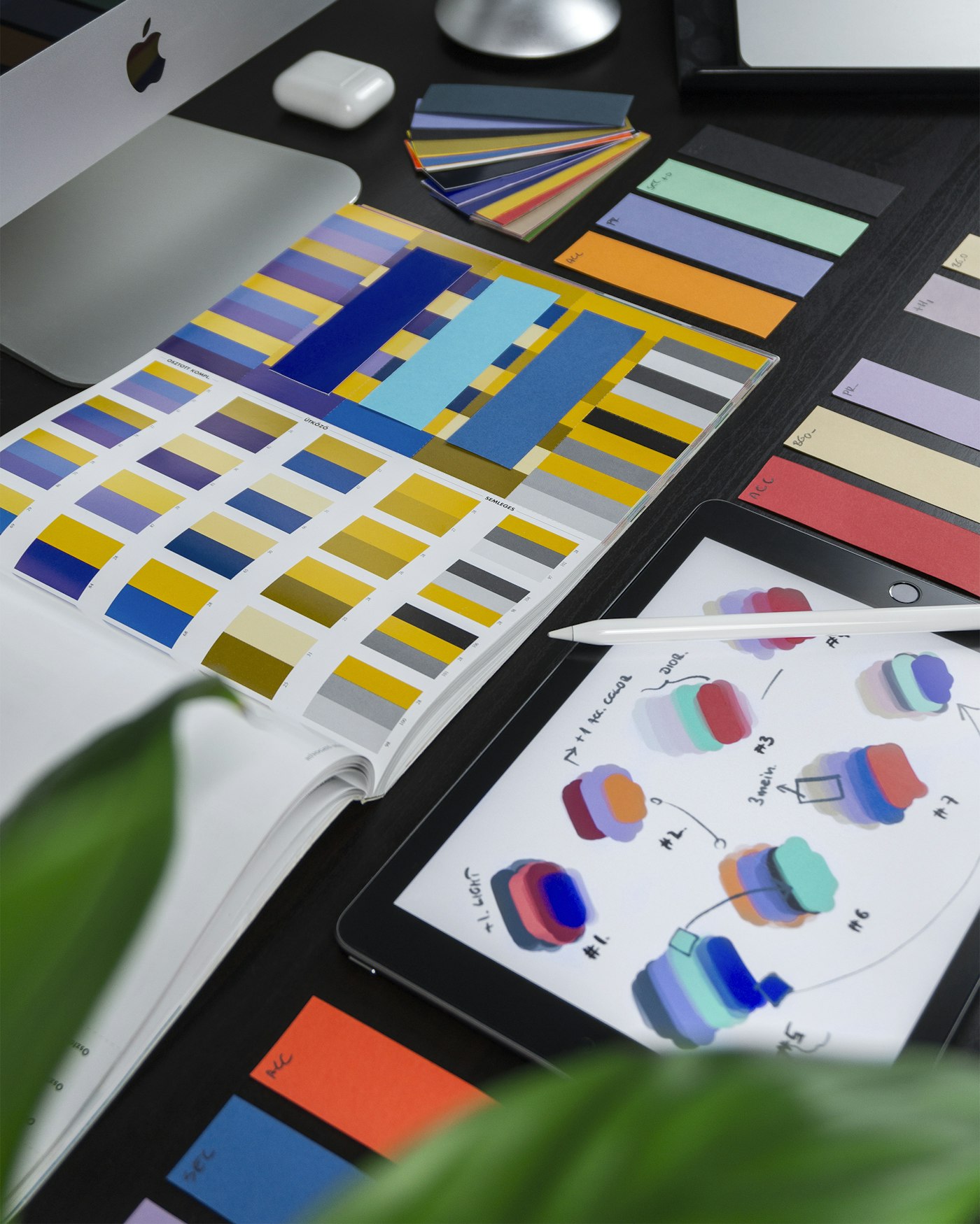 Colour palettes and design tools used to build a brand system